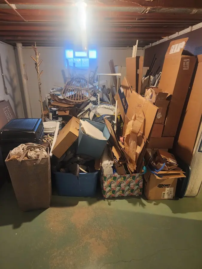 Roll-off dumpster container at job site for 4 Yard Dumpster Rental in Fletcher